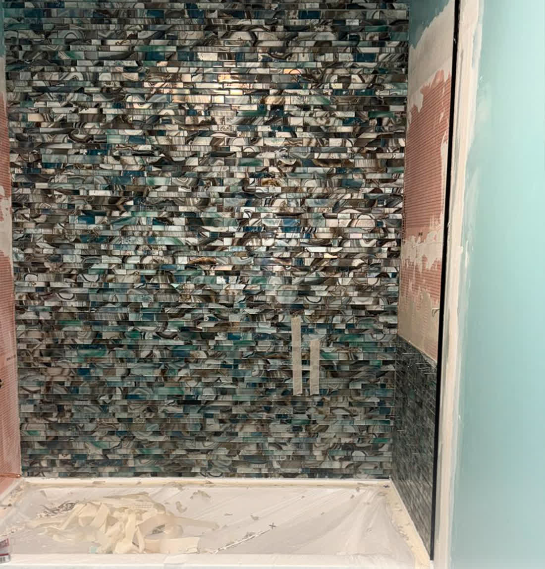 Stone feature wall installed in a bathroom
