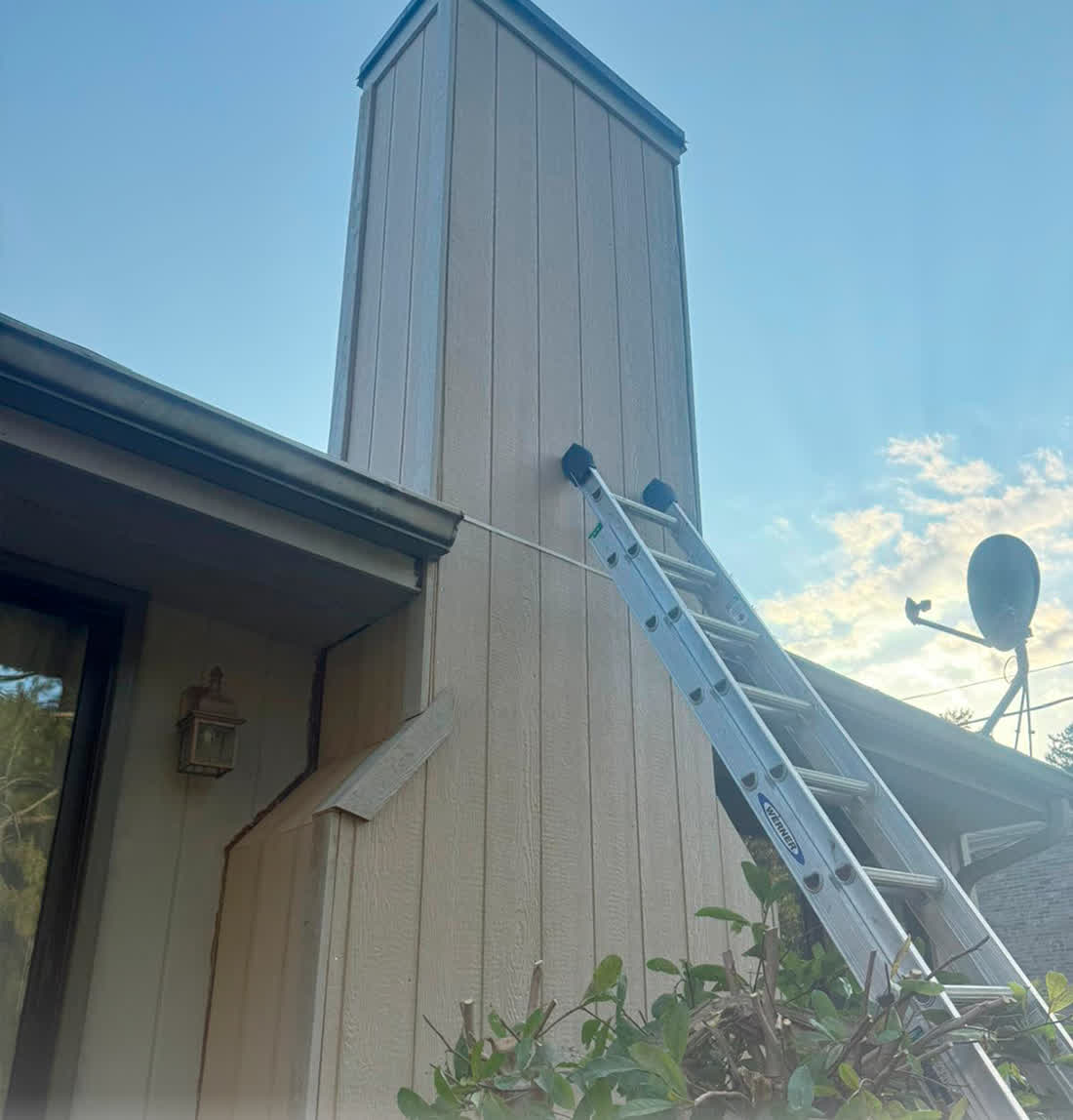 Chimney rebuilt with Hardie siding and trim