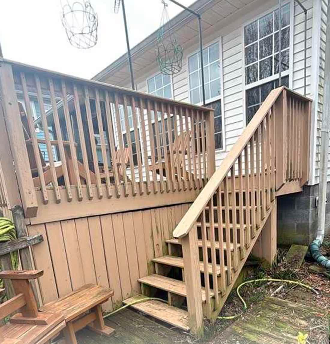 Rebuilt deck with stairs and handrails