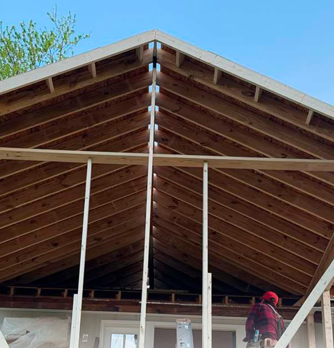 High-pitch porch roof framed with tongue and groove ceiling
