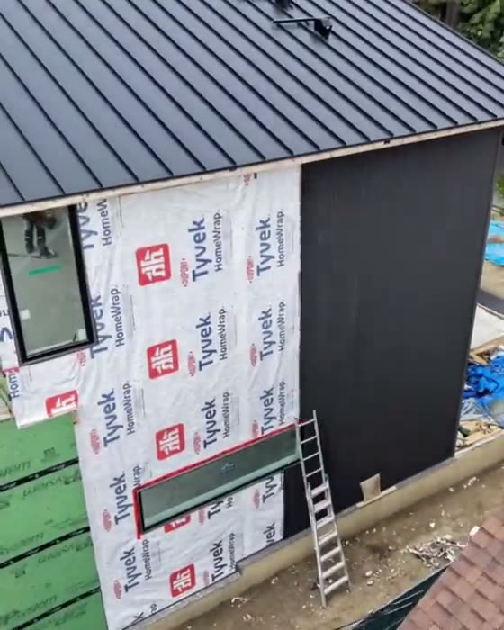 Standing seam metal roof on a modern building